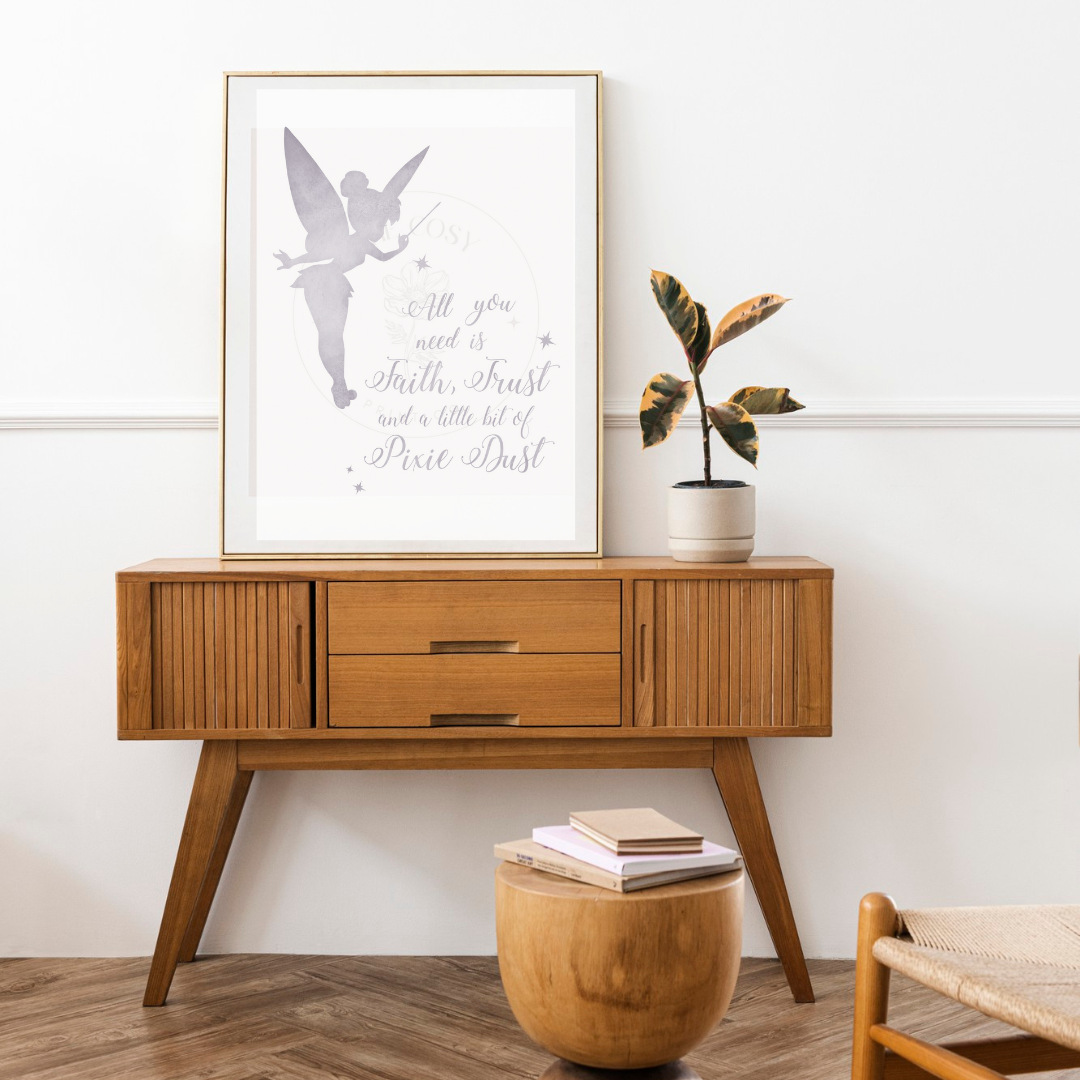 Black and white silhouette of Tinker Bell with “Faith, Trust & Pixie Dust” quote