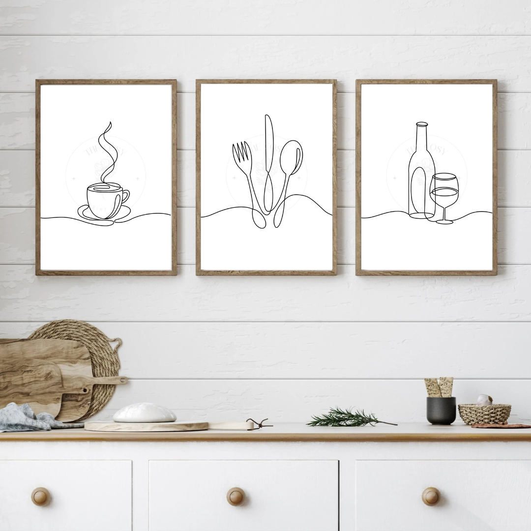 Trio of black and white kitchen prints featuring coffee, cutlery, and wine line drawings.
