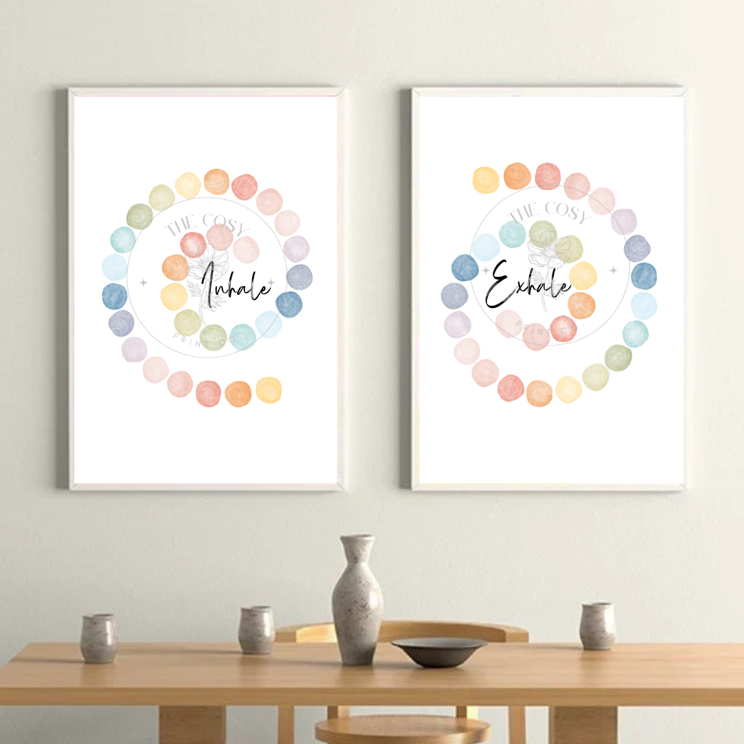 Two minimalist prints with the words "Exhale" and "Inhale" in script, each paired with soft, circular watercolour dots on a white background.