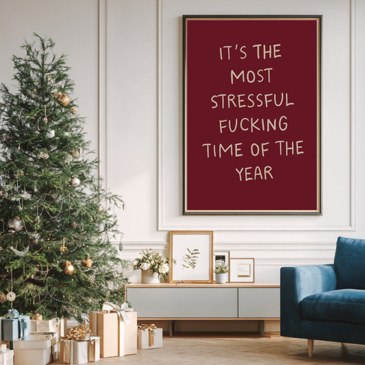 Adult humour Christmas print reading “The Most Stressful F-ing Time of the Year” in deep red hand-lettering.