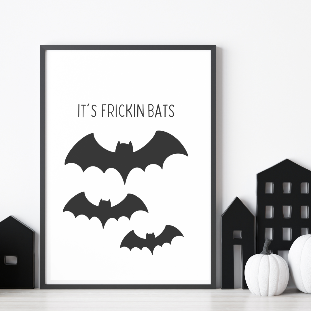 Black and white minimalist print featuring the Halloween quote “It’s Fricken Bats” – hand-drawn wall art by The Cosy Print Company printed on 200gsm Colour-Lock™ paper, available in A4 and A3 sizes.