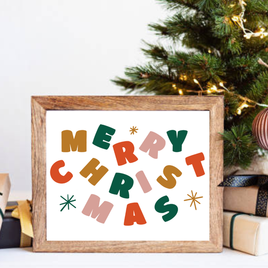 Hand-drawn Christmas print reading “Merry Christmas” in bold, colourful lettering.