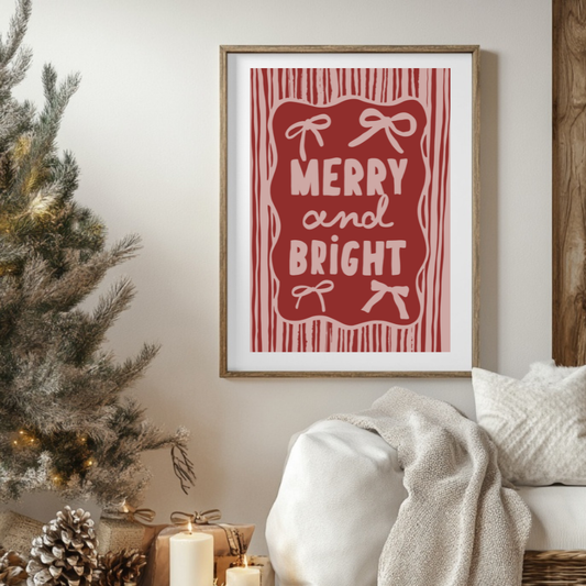 Hand-drawn Christmas print reading “Merry and Bright” in pinks and reds with bows and stripes.