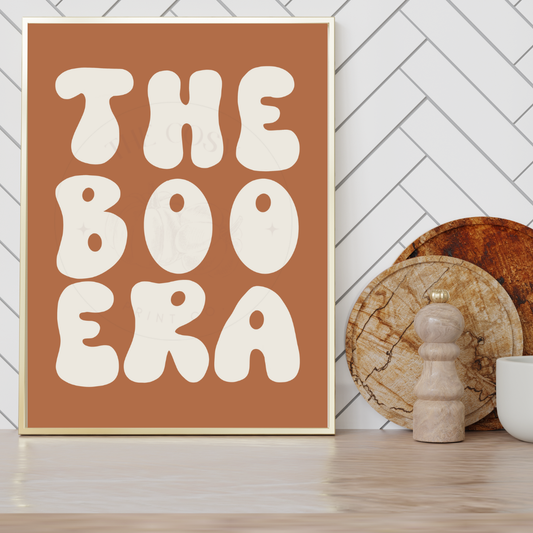 Minimal orange and cream wall art print with bold text reading “The Boo Era” – Halloween decor by The Cosy Print Company, printed on 200gsm Colour-Lock™ paper, available in A4 and A3 sizes.